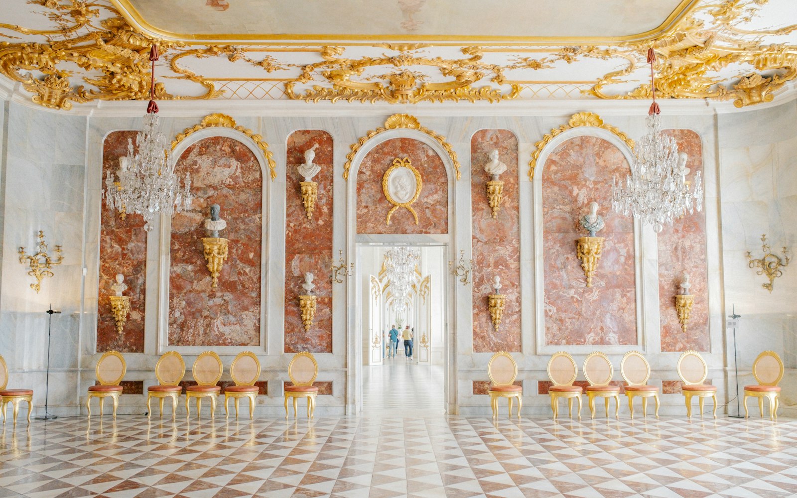 An elegant banquet hall set for a wedding reception
